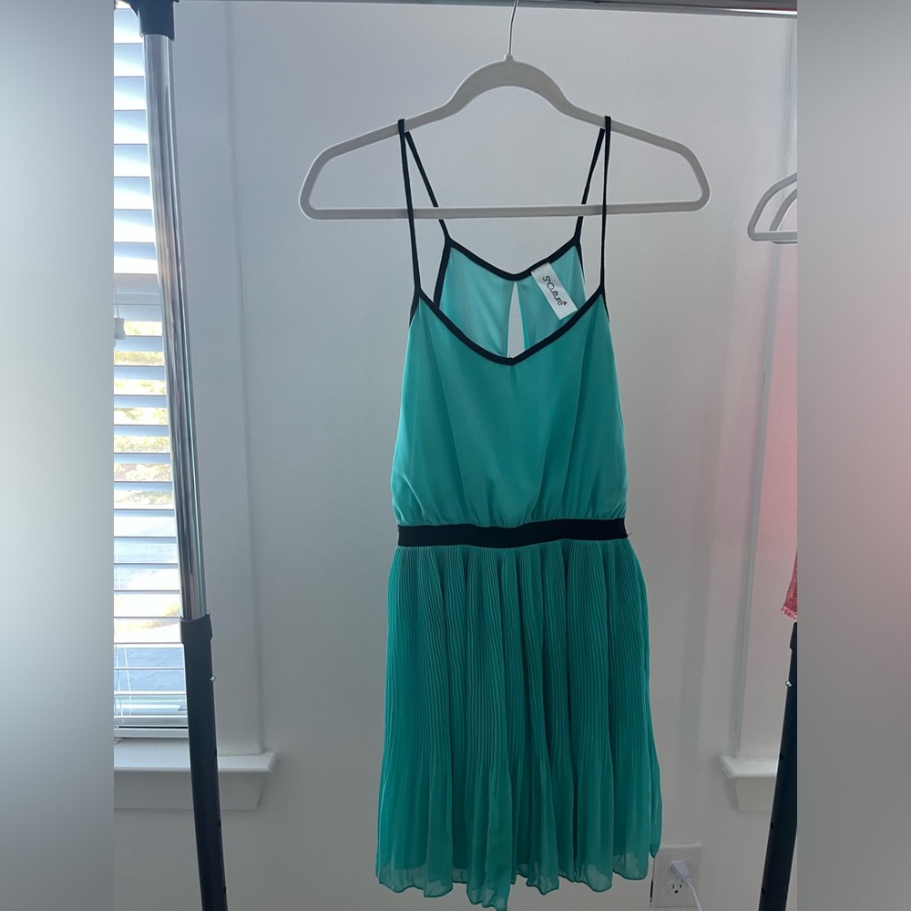 Turquoise cocktail party dress with black trim. Brand is 5th Culture. Size S